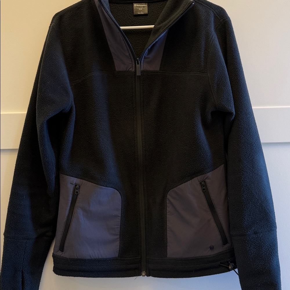 Backcountry medium, style W543 soft shell full zip jacket, two front zip pockets